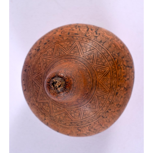 410 - AN ANTIQUE CONTINENTAL CARVED AND ENGRAVED GOURD NUT. 14 cm x 7 cm.