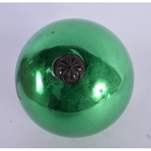 412 - AN ANTIQUE GLASS WITCHES BALL. 13.5 cm wide.