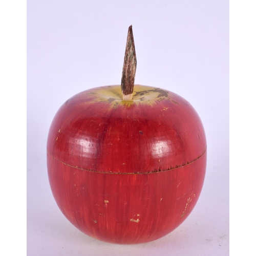 415 - A CARVED AND PAINTED FOLK ART APPLE WOOD BOX AND COVER. 9 cm x 6 cm.