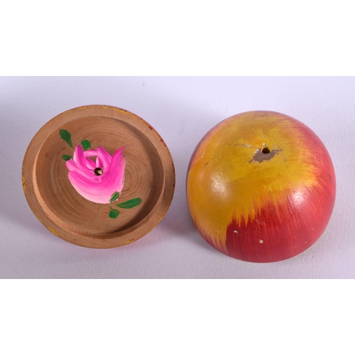 415 - A CARVED AND PAINTED FOLK ART APPLE WOOD BOX AND COVER. 9 cm x 6 cm.