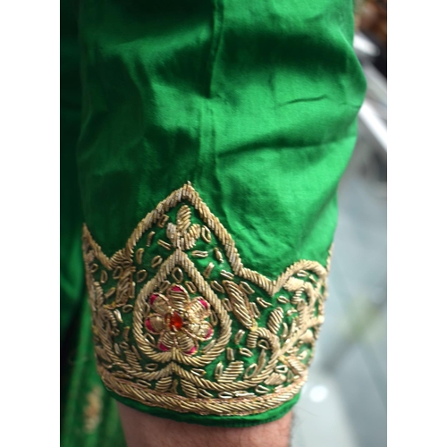 418 - AN INDIAN SILVER THREAD GREEN SILK PEACOCK ROBE. 110 cm x 115 cm.