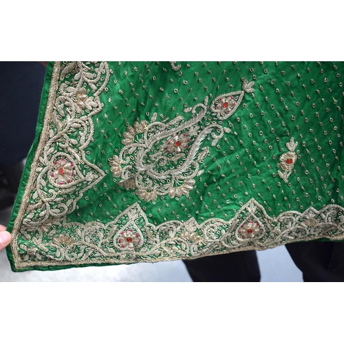 418 - AN INDIAN SILVER THREAD GREEN SILK PEACOCK ROBE. 110 cm x 115 cm.