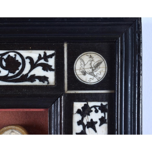 419 - A 19TH CENTURY FRAMED SET OF COUNTRY HOUSE PLASTER INTAGLIOS contained within an Italian ebonised fr... 