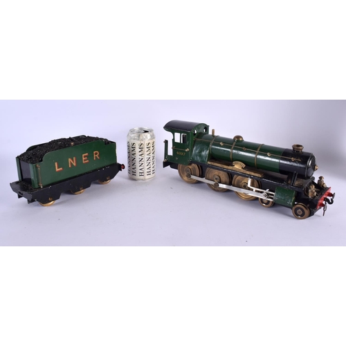 421 - A SCRATCH BUILT LOCOMOTIVE TRAIN AND TENDER Mongrel, No 4697. 56 cm long inc tender. (2)