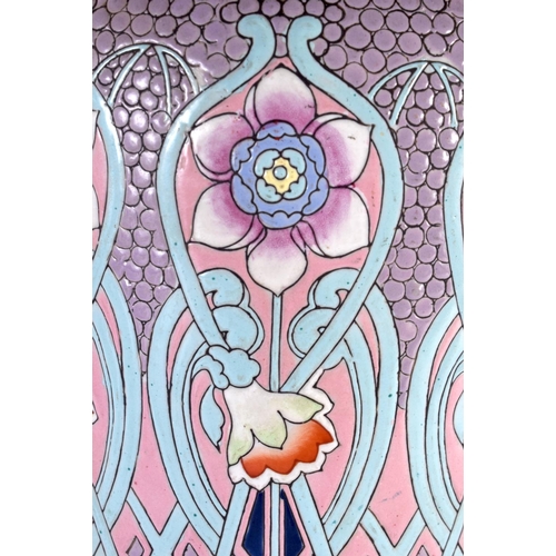 422 - AN ART NOUVEAU ENAMELLED PORCELAIN LAMP painted with flowers. 48 cm x 18 cm.