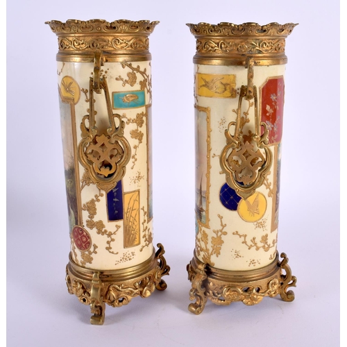 43 - A PAIR OF 19TH CENTURY FRENCH AESTHETIC MOVEMENT PORCELAIN VASES mounted in Japanese inspired bronze... 