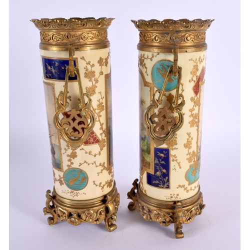 43 - A PAIR OF 19TH CENTURY FRENCH AESTHETIC MOVEMENT PORCELAIN VASES mounted in Japanese inspired bronze... 