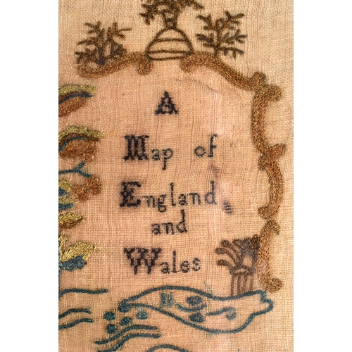 435 - AN 18TH CENTURY FRAMED SAMPLER MAP OF ENGLAND AND WALES by Ann Ambler 1785. 60 cm x 54 cm.