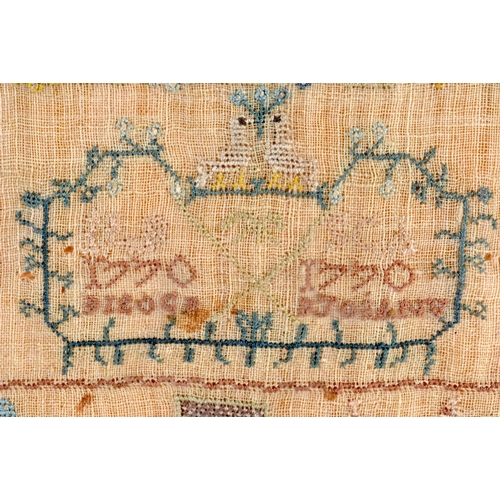 438 - AN 18TH CENTURY FRAMED EMBROIDERED SAMPLER C1770. 32 cm square.