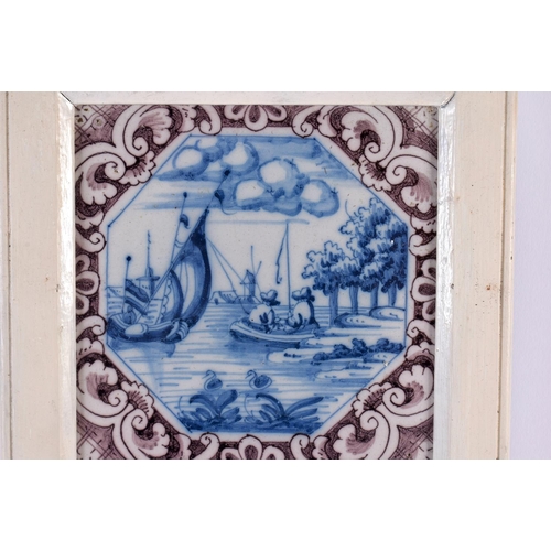 44 - A SET OF THREE 18TH CENTURY DUTCH DELFT MANGANESE BLUE AND WHITE TILES. 42 cm x 15 cm.