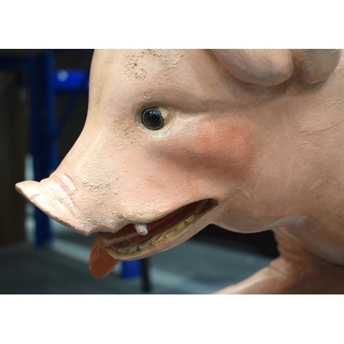 443 - A CHARMING EARLY 20TH CENTURY CARVED AND PAINTED CAROUSEL PIG Attributed to Gustave Bayol. 85 cm x 5... 