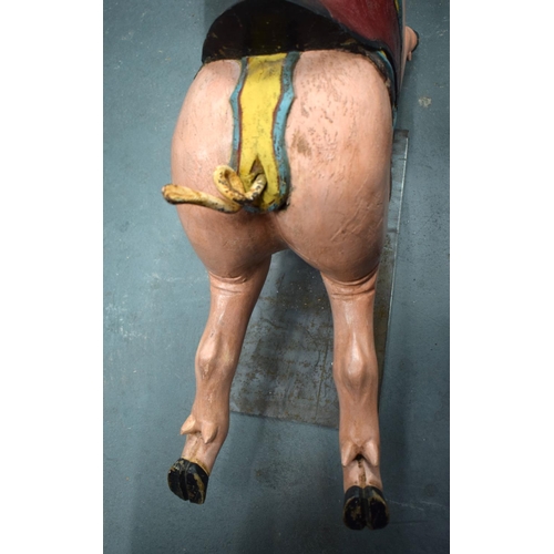 443 - A CHARMING EARLY 20TH CENTURY CARVED AND PAINTED CAROUSEL PIG Attributed to Gustave Bayol. 85 cm x 5... 