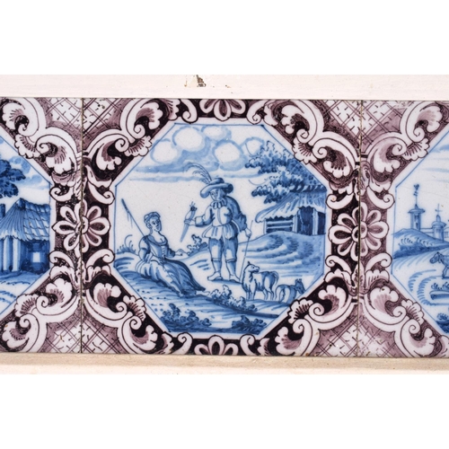 45 - A SET OF THREE 18TH CENTURY DUTCH DELFT MANGANESE BLUE AND WHITE TILES. 42 cm x 15 cm.