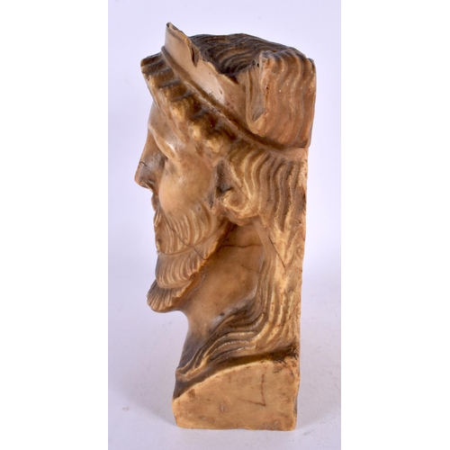 455 - AN EARLY GREEK CARVED STONE MARBLE HEAD OF A GOD modelled as a bearded male. 21 cm x 12 cm.