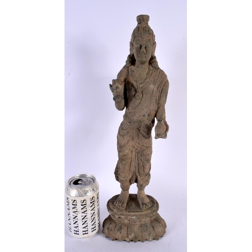 456 - A LARGE SOUTH EAST ASIAN BRONZE FIGURE OF A STANDING BUDDHA modelled upon a lotus type base. 42 cm h... 