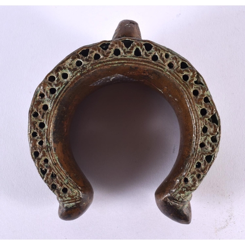 461 - A LARGE 18TH/19TH CENTURY MIDDLE EASTERN BRONZE CUFF BANGLE. 13 cm x 13 cm.