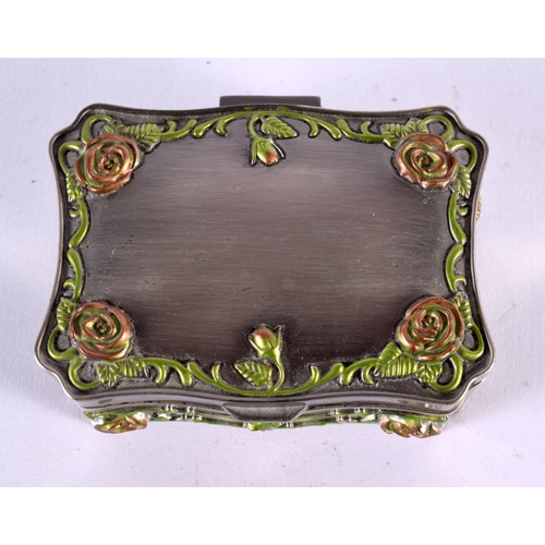 465 - AN UNUSUAL ENAMELLED WHITE METAL JEWELLERY BOX overlaid with foliage and vines. 381 grams. 10 cm x 7... 