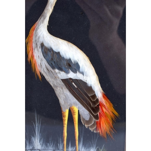 468 - AN UNUSUAL ANTIQUE CONTINENTAL FEATHER WORK GOUACHE PAINTING depicting a stork within a landscape. 4... 