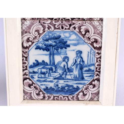 47 - A SET OF THREE 18TH CENTURY DUTCH DELFT MANGANESE BLUE AND WHITE TILES. 42 cm x 15 cm.