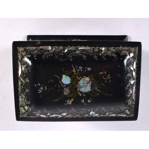 488 - AN ANTIQUE MOTHER OF PEARL INLAID BLACK PAPIER MACHE TEA CADDY. 15 cm x 12 cm.