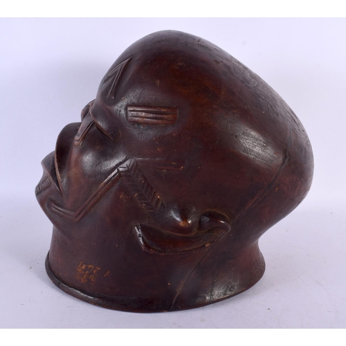 494 - A GOOD EARLY 20TH CENTURY AFRICAN TRIBAL MAKONDE LIPIKO WOOD MASK used by an elder to celebrate the ... 