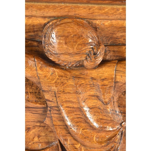 496 - A LOVELY ART DECO CARVED WOOD WALL BRACKET formed as a stylised female holding aloft a draped dress.... 