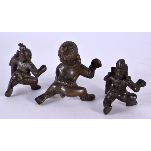 504 - THREE 18TH/19TH CENTURY INDIAN BRONZE FIGURES OF ROAMING BUDDHA all modelled resting upon one leg. L... 