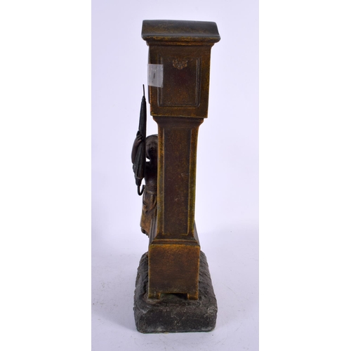 509 - AN EARLY 20TH CENTURY COLD PAINTED SPELTER MANTEL CLOCK formed as a child holding an umbrella beside... 