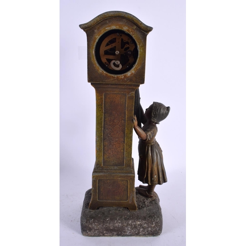 509 - AN EARLY 20TH CENTURY COLD PAINTED SPELTER MANTEL CLOCK formed as a child holding an umbrella beside... 