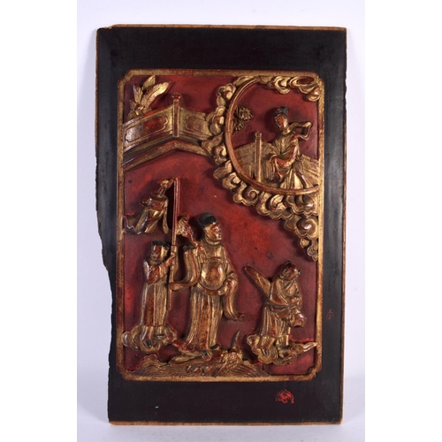 529 - A 19TH CENTURY CHINESE AND PAINTED LACQUERED WOOD PANEL Qing, depicting numerous figures within an i... 