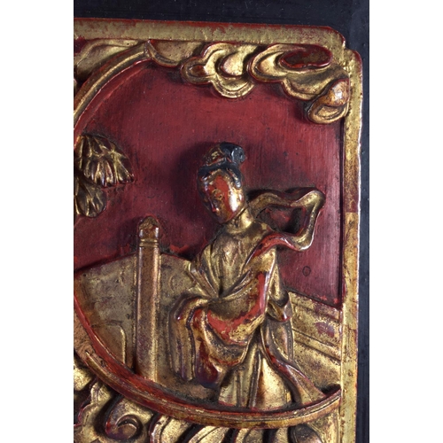 529 - A 19TH CENTURY CHINESE AND PAINTED LACQUERED WOOD PANEL Qing, depicting numerous figures within an i... 