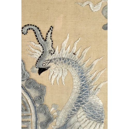 532 - A LARGE UNUSUAL 19TH CENTURY CHINESE SILK EMBROIDERED PANEL Qing, depicting opposing phoenix. 66 cm ... 