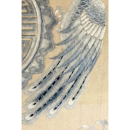 532 - A LARGE UNUSUAL 19TH CENTURY CHINESE SILK EMBROIDERED PANEL Qing, depicting opposing phoenix. 66 cm ... 