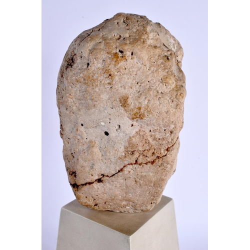 535 - A RARE ROMANO BRITISH CARVED LIMESTONE HEAD C200AD depicting an elderly male, upon a white painted w... 