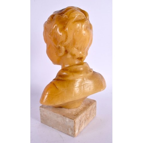 544 - AN EARLY 20TH CENTURY EUROPEAN WAX BUST OF A YOUNG BOY upon a marble base. 20 cm high.