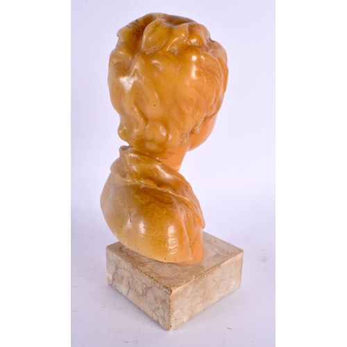 544 - AN EARLY 20TH CENTURY EUROPEAN WAX BUST OF A YOUNG BOY upon a marble base. 20 cm high.