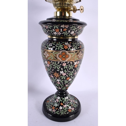 551 - A LARGE VICTORIAN ENAMELLED GLASS OIL LANTERN painted all over with flowers and vines. 60 cm x 13 cm... 