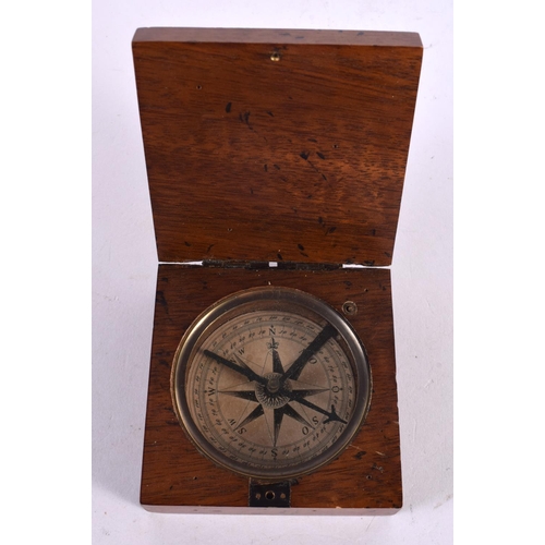 557 - AN ANTIQUE POCKET COMPASS. 8 cm square.