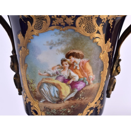 56 - A LARGE PAIR OF 19TH CENTURY FRENCH SEVRES PORCELAIN VASES AND COVERS painted with lovers in landsca... 