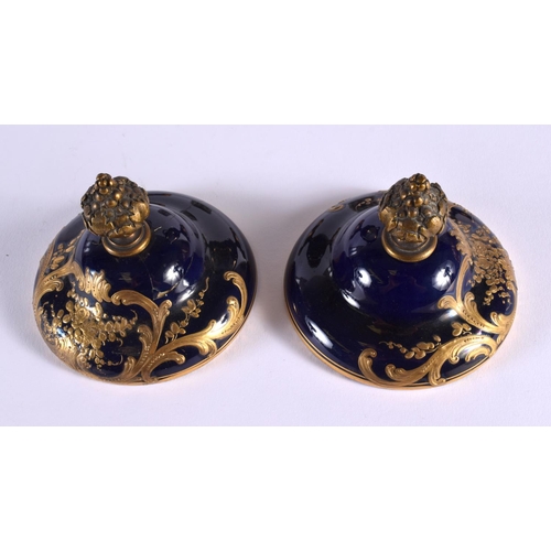 56 - A LARGE PAIR OF 19TH CENTURY FRENCH SEVRES PORCELAIN VASES AND COVERS painted with lovers in landsca... 