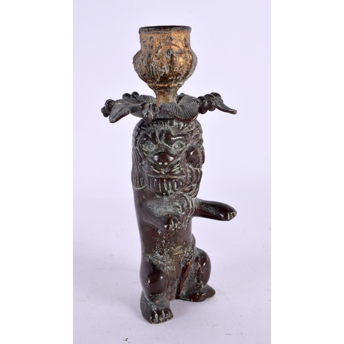 561 - A 17TH/18TH CENTURY EUROPEAN BRONZE FIGURE OF A LION formed as a candlestick. 16 cm high.