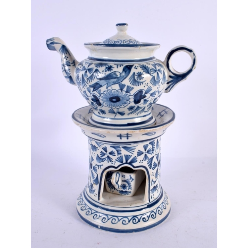 564 - A  DELFT BLUE AND WHITE TEAPOT ON STAND painted with birds and foliage. 21 cm x 15 cm.