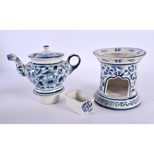 564 - A  DELFT BLUE AND WHITE TEAPOT ON STAND painted with birds and foliage. 21 cm x 15 cm.