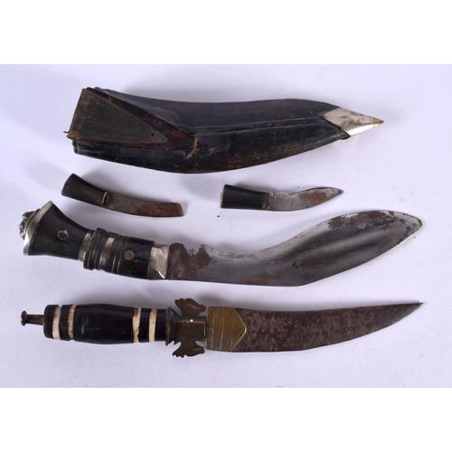 569 - TWO NEPALESE HORN HANDLED GURKHA KNIVES. 22 cm long. (2)