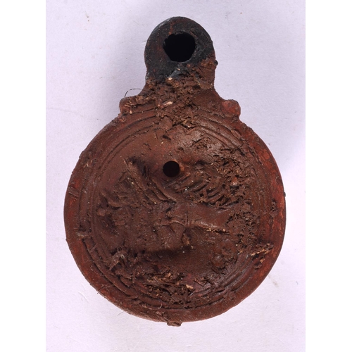 576 - A GRAND TOUR POTTERY OIL LAMP After the Antiquity. 7 cm x 5 cm.