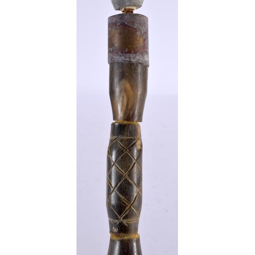 578 - AN UNUSUAL EARLY 20TH CENTURY MIDDLE EASTERN CARVED FULL LENGTH HORN WALKING CANE with Egyptian head... 