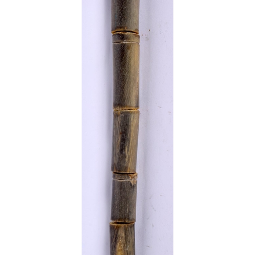 578 - AN UNUSUAL EARLY 20TH CENTURY MIDDLE EASTERN CARVED FULL LENGTH HORN WALKING CANE with Egyptian head... 