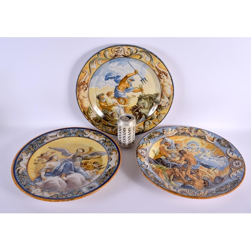 584 - THREE LARGE 19TH CENTURY ITALIAN MAJOLICA DISHES painted with figures. 34 cm diameter. (3)