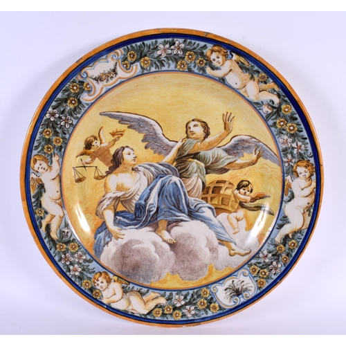 584 - THREE LARGE 19TH CENTURY ITALIAN MAJOLICA DISHES painted with figures. 34 cm diameter. (3)