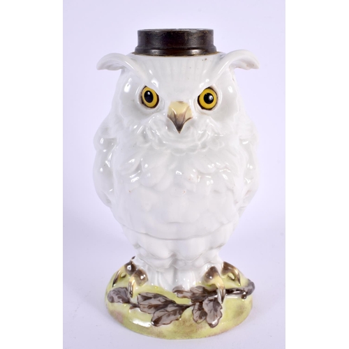 585 - A SMALL 19TH CENTURY COUNTRY HOUSE OWL POTTERY OIL LAMP BASE. 16 cm high.